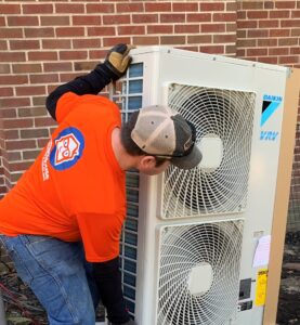 Smart house tech installing mini split at a home