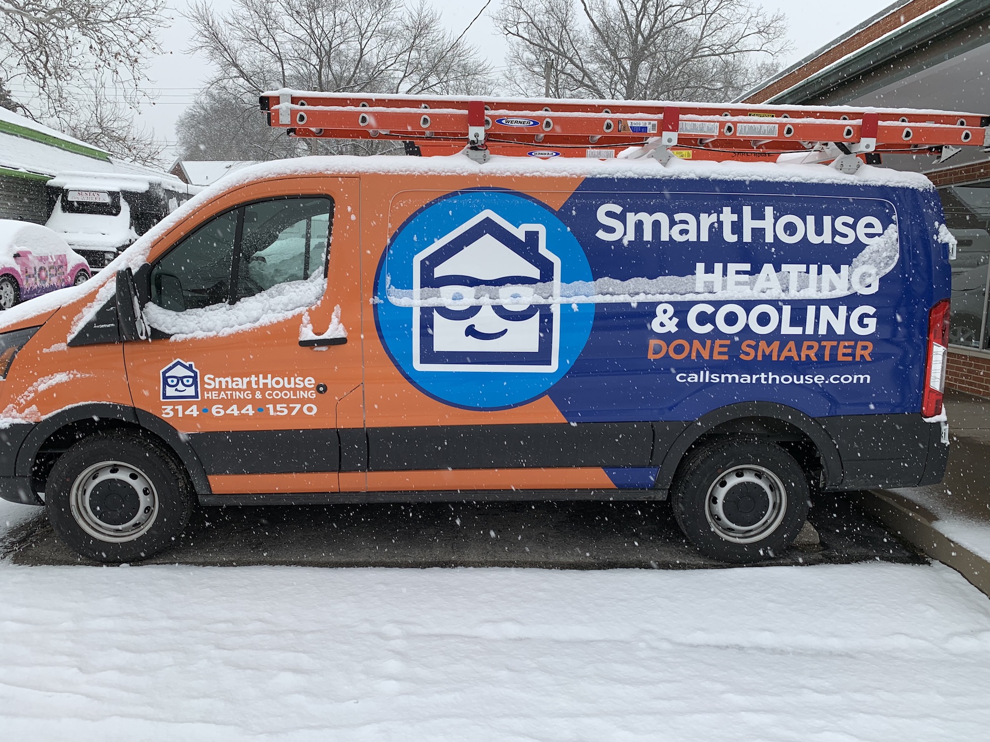 SmartHouse fleet truck in winter dusted with snow